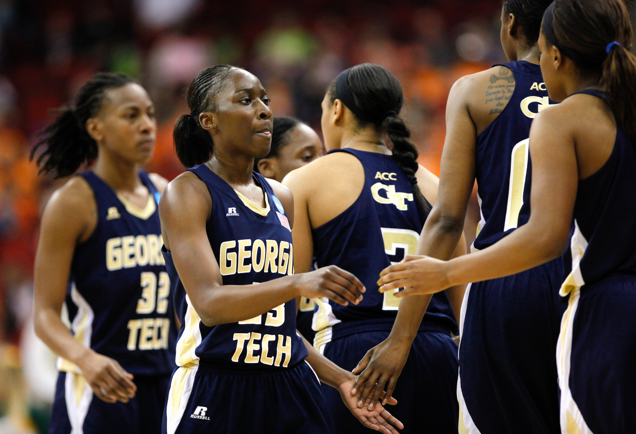 Georgia Tech's players, including Sydney Wallace, center, go for a time out in the first half. (AP Photo/Nati Harnik)