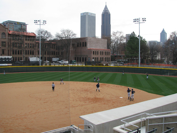 Softball team practices in its new stadium for the first time.