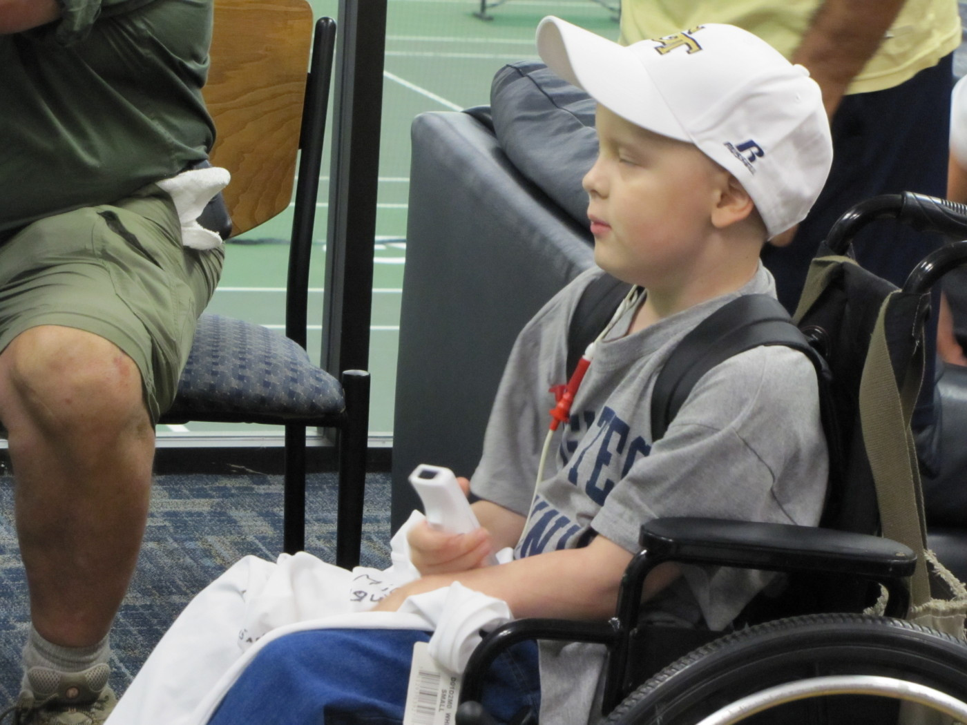 Nolan gets ready to play Wii Tennis.