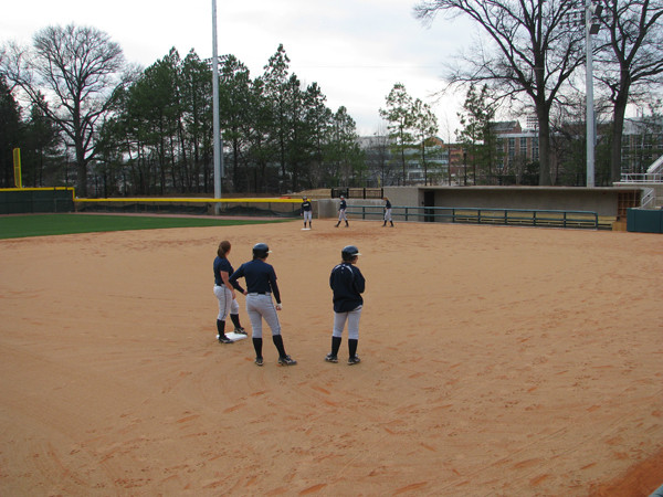 Softball team practices in its new stadium for the first time.