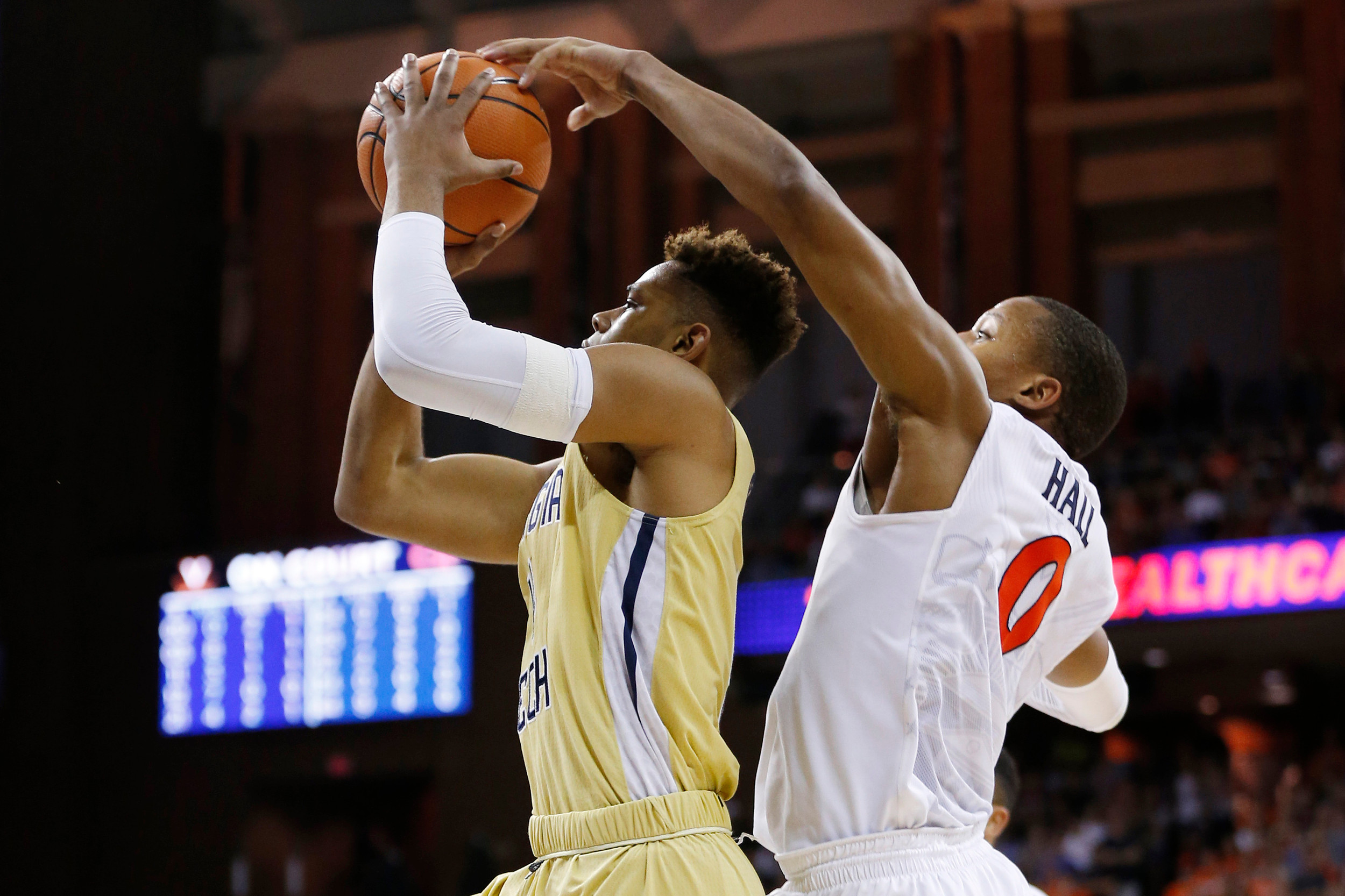 Feb 21, 2018; Charlottesville, VA, USA; Georgia Tech Yellow Jackets guard Brandon Alston (4) attempts to shoot the ball as Virginia Cavaliers guard Devon Hall (0) defends during the first half at John Paul Jones Arena. Mandatory Credit: Amber Searls-USA TODAY Sports