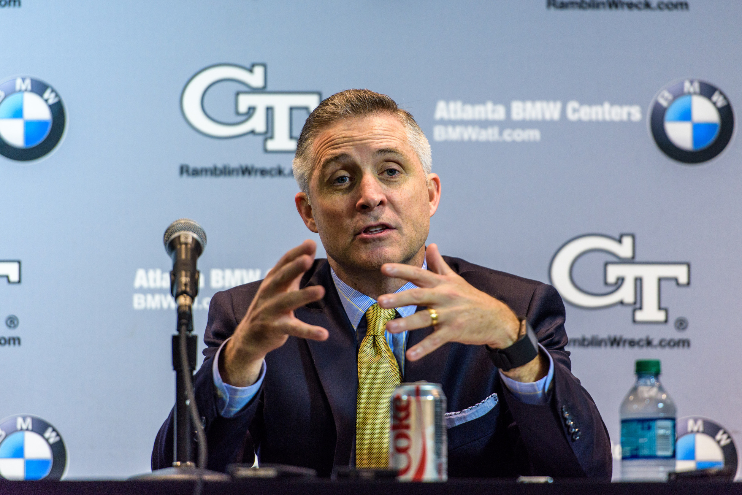 Coach Brian Gregory talks to the media in the postgame press conference