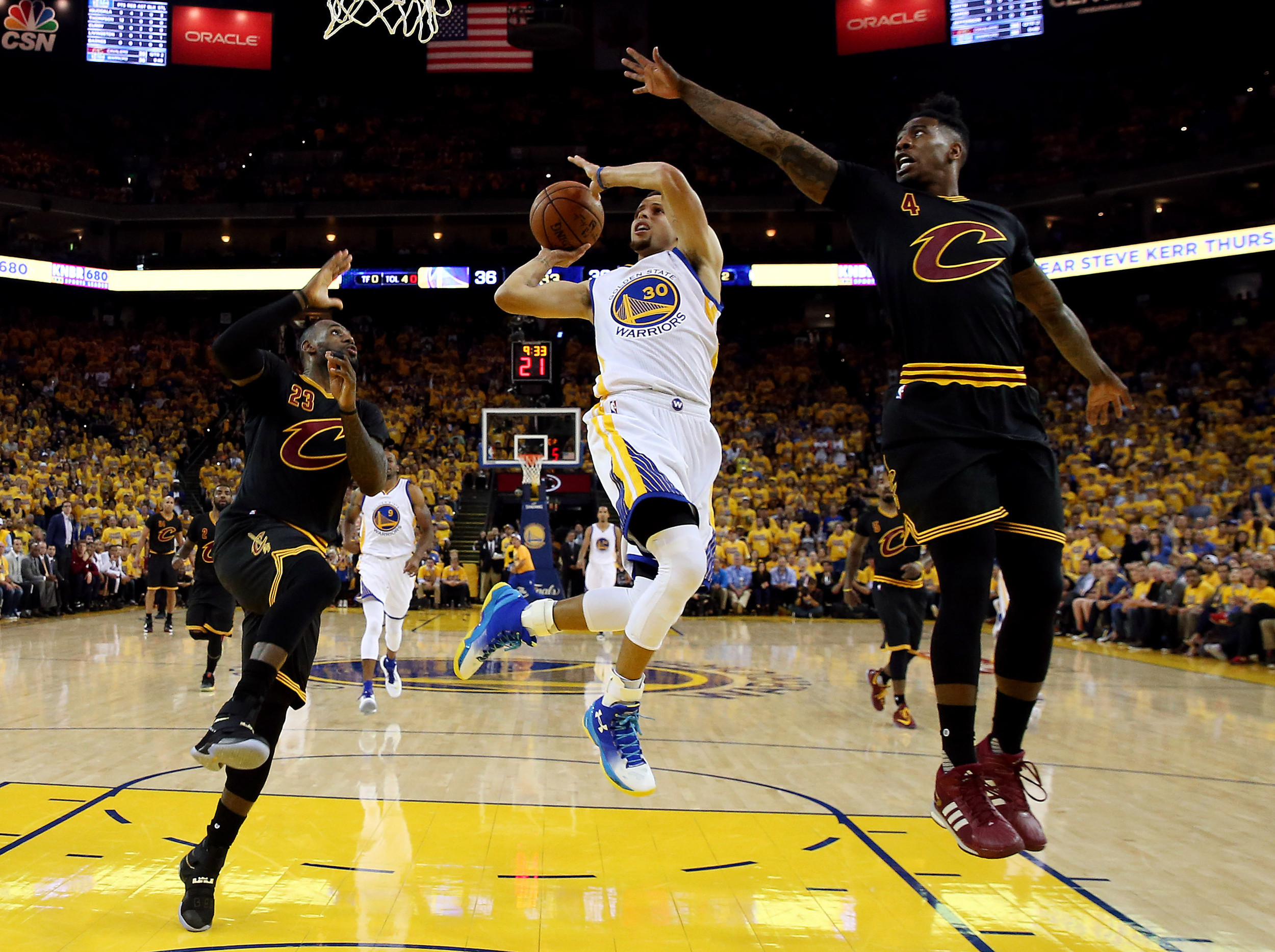 Jun 13, 2016; Oakland, CA, USA; Golden State Warriors guard Stephen Curry (30) shoots the ball against Cleveland Cavaliers guard Iman Shumpert (4) during game five of the NBA Finals. Credit: Bob Donnan-USA TODAY Sports