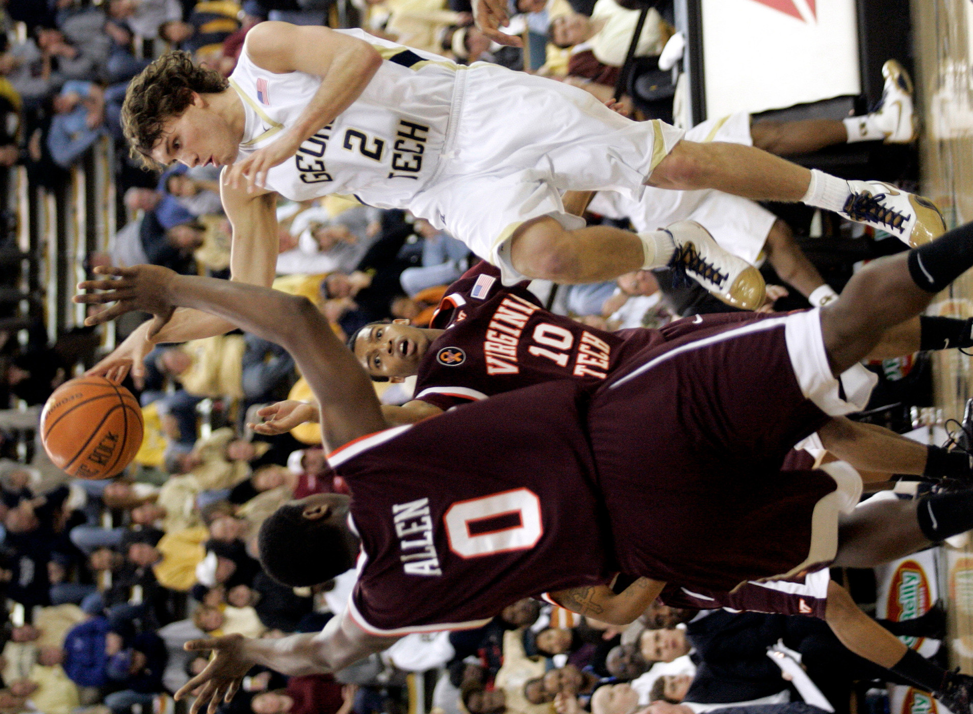 Matt Causey shoots over Virginia Tech's Jeff Allen (0) and Hank Thorns (10) Saturday in Atlanta. (AP Photo/Tami Chappell)