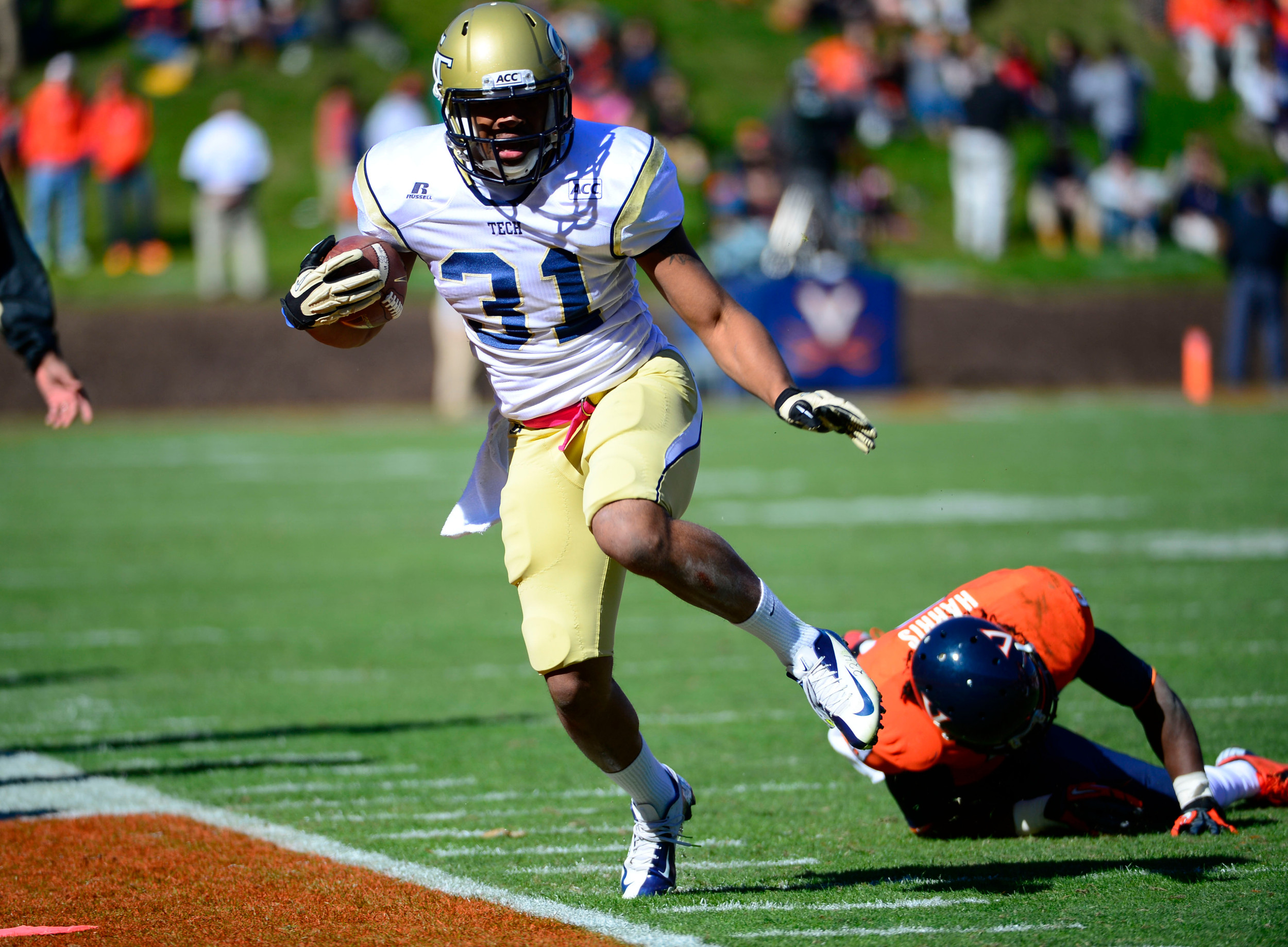 Deon Hill (31) with the ball as Virginia Cavaliers safety Anthony Harris (8) defends. Mandatory Credit: Bob Donnan-USA TODAY Sports