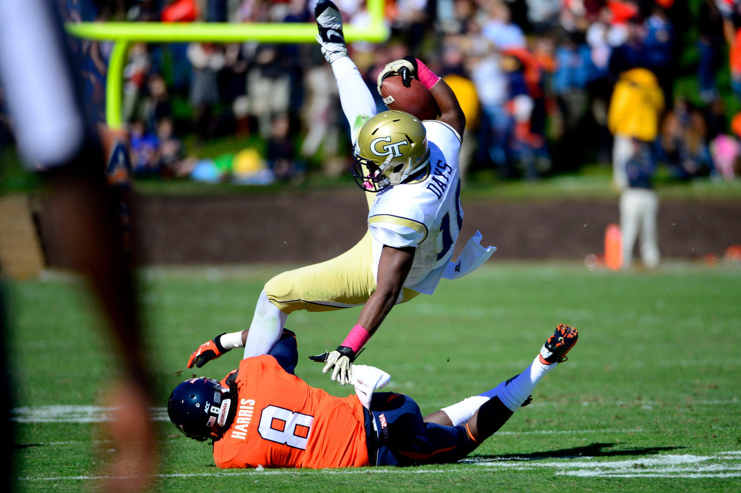Synjyn Days (10) is tackled by Virginia Cavaliers safety Anthony Harris (8). Mandatory Credit: Bob Donnan-USA TODAY Sports